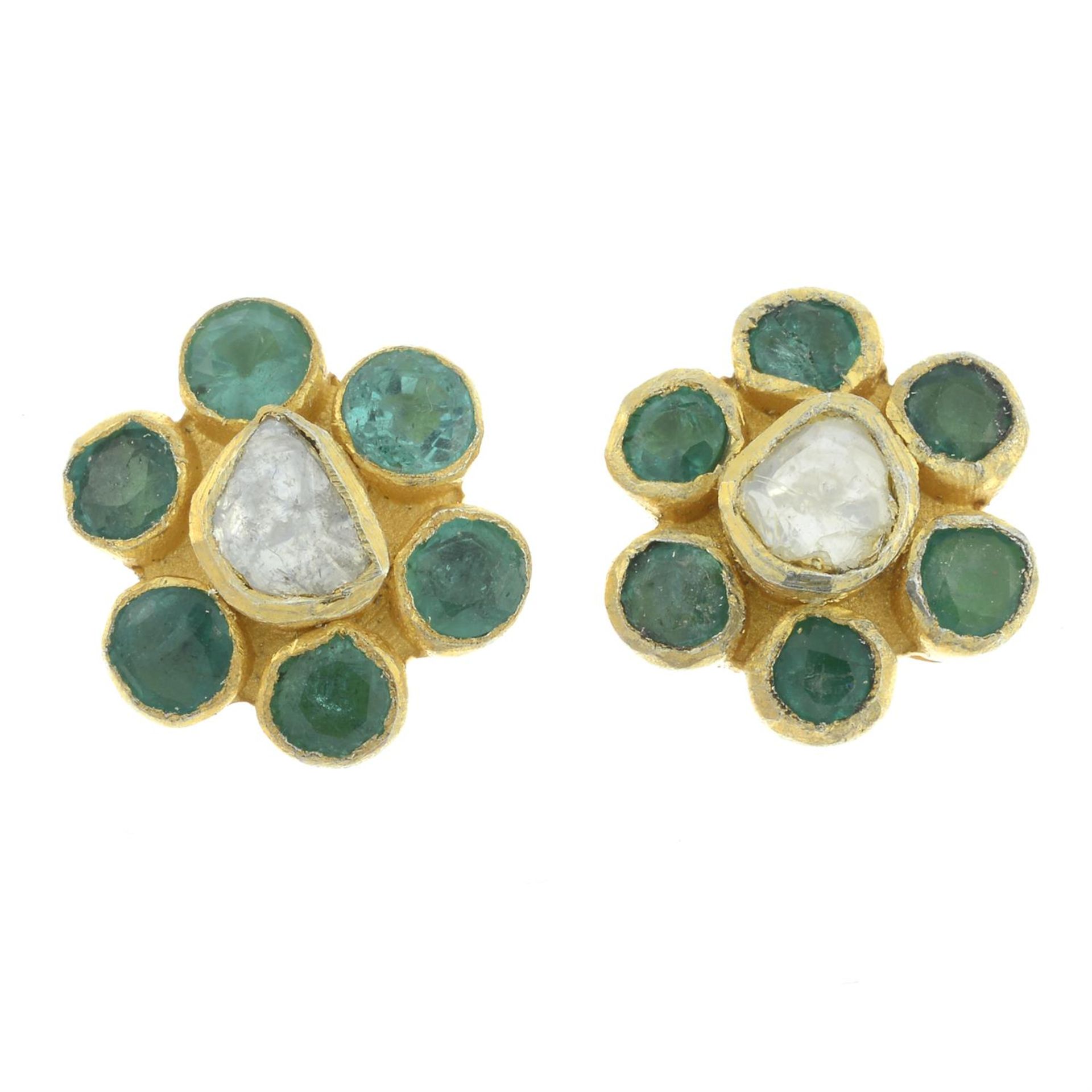 A pair of emerald and polki diamond cluster earrings.