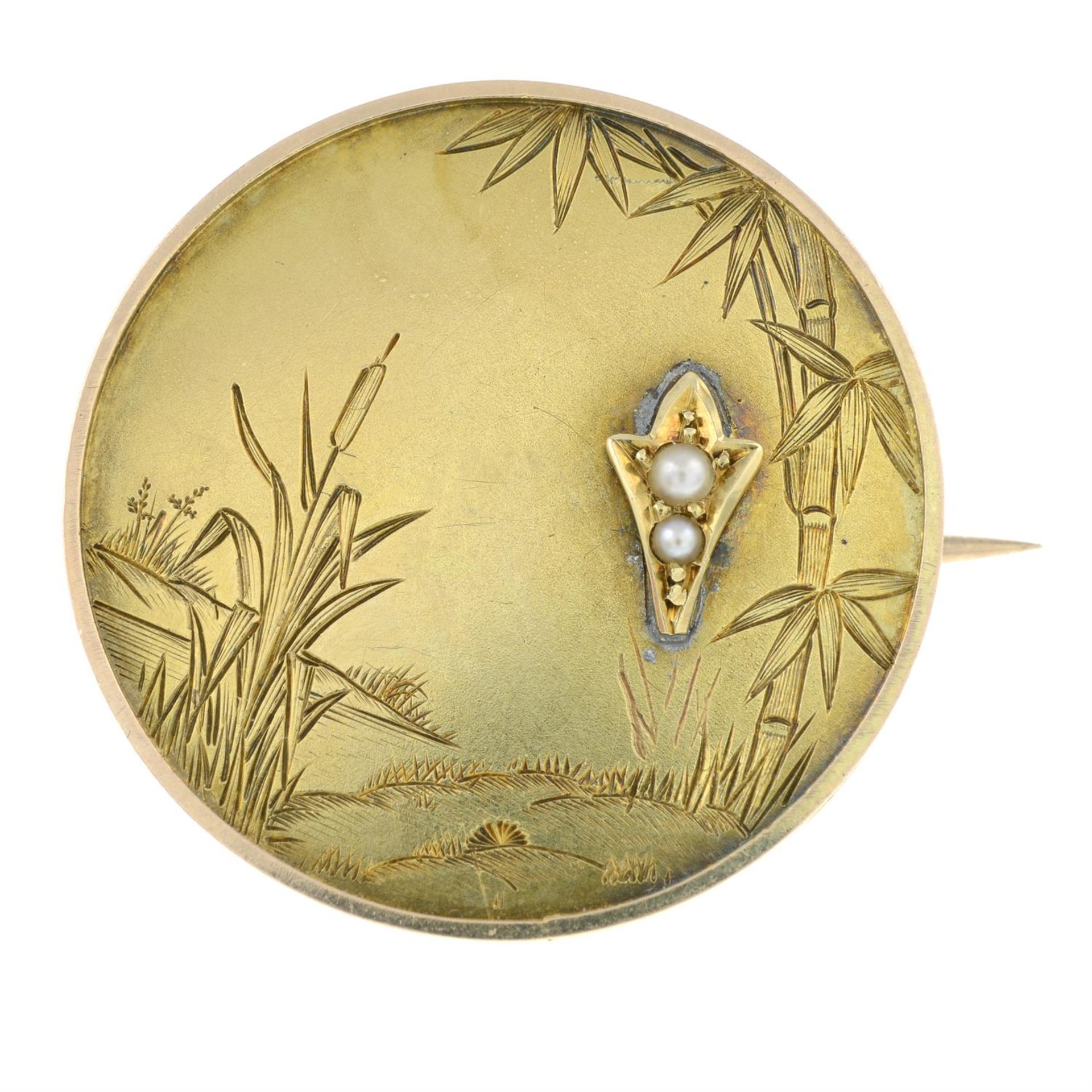 A late 19th century brooch, depicting reeds, with split pearl highlight.
