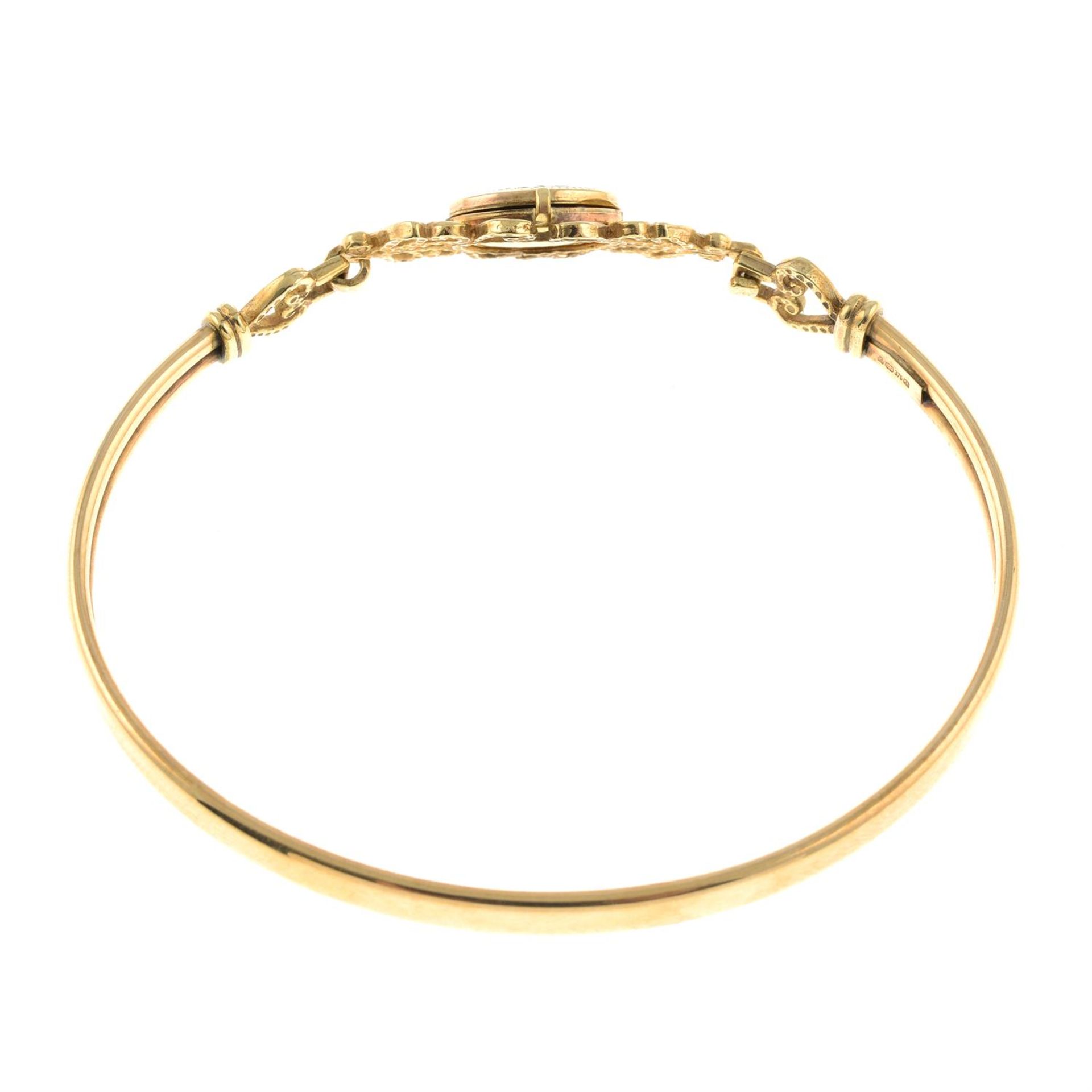 A 9ct gold locket bangle. - Image 2 of 2