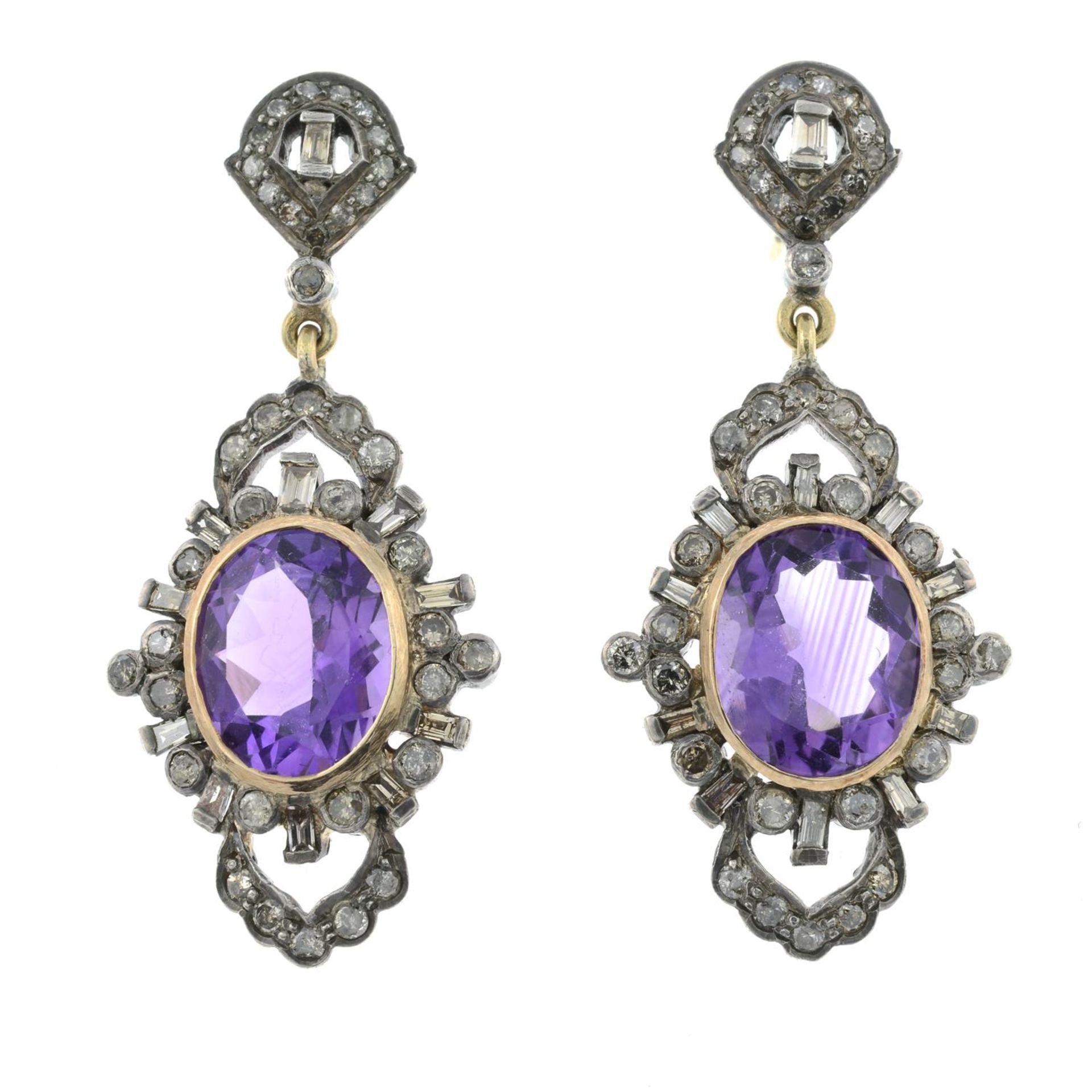 A pair of amethyst and diamond drop earrings.