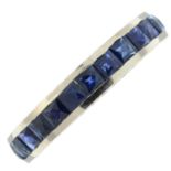 A sapphire full eternity ring, with engraved sides.