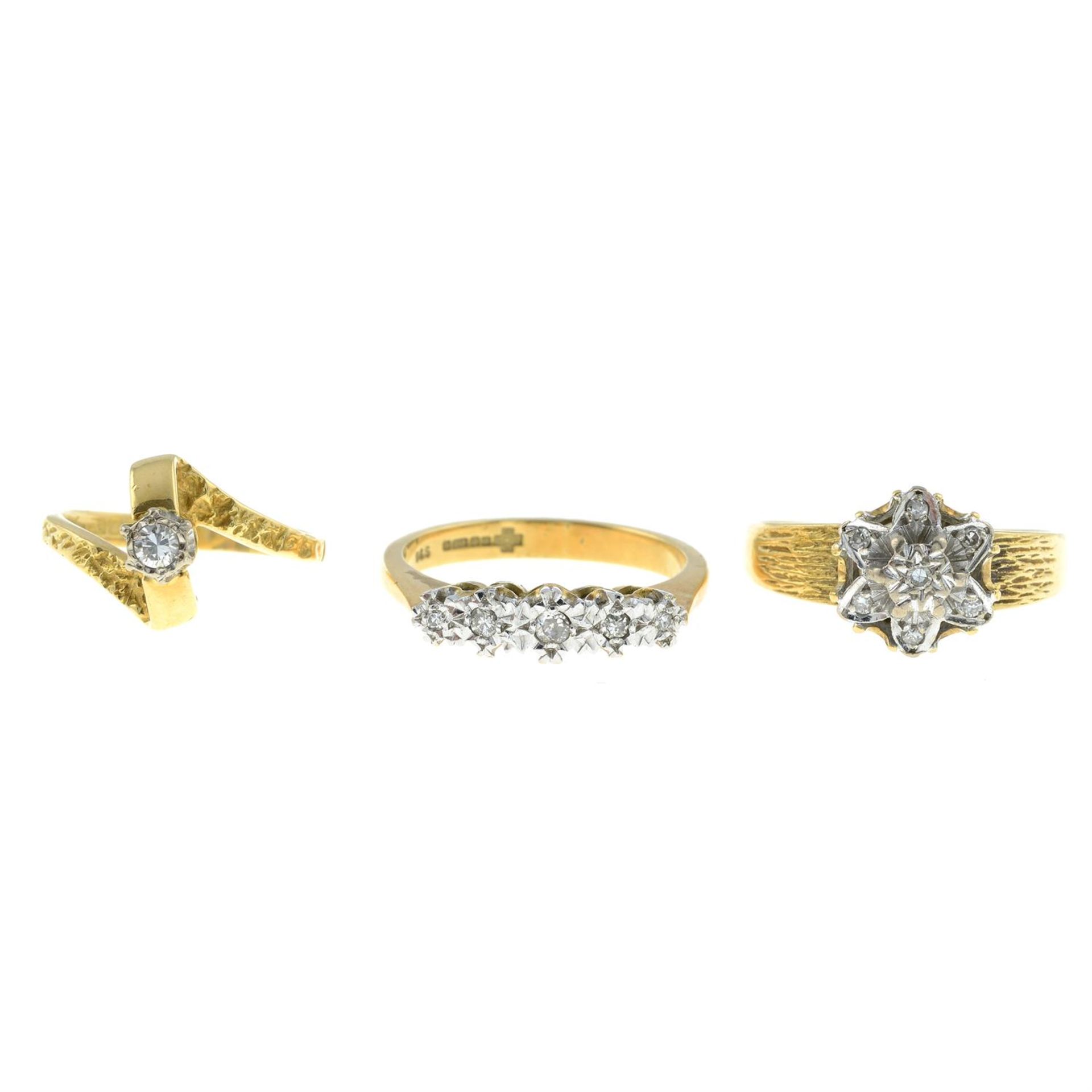 Three 18ct gold diamond rings.