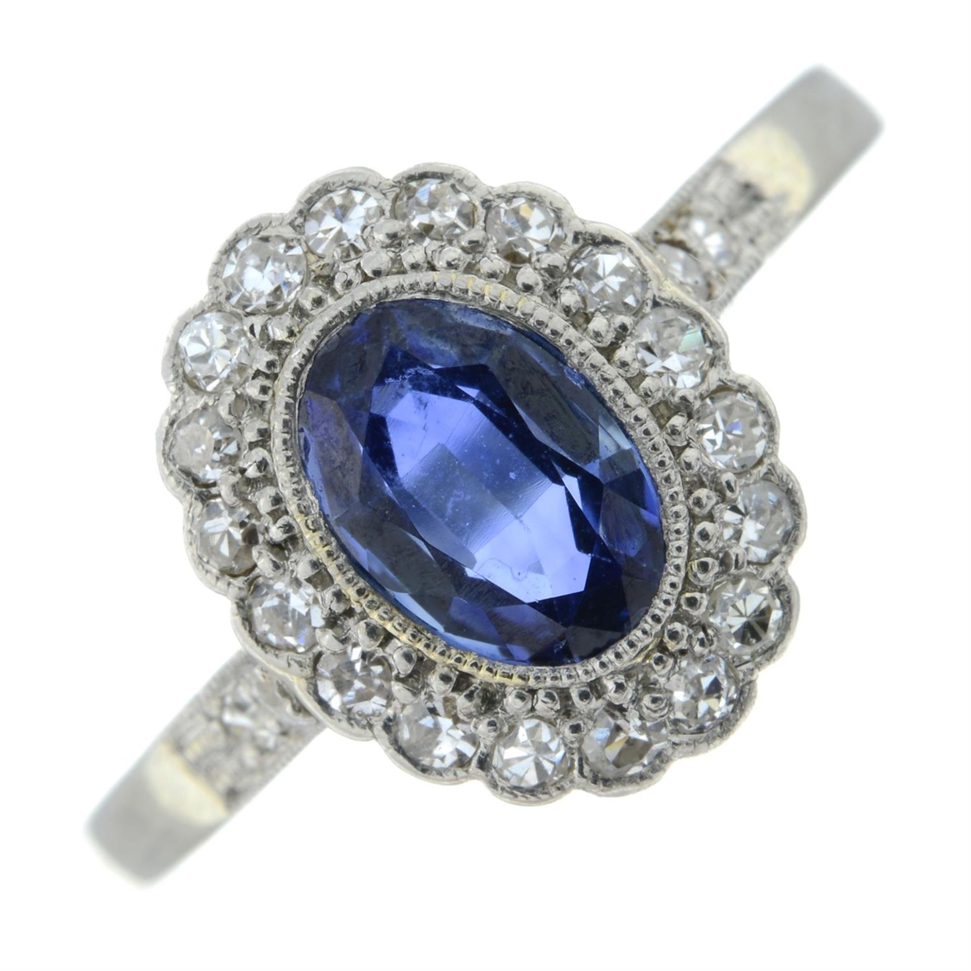 A sapphire and single-cut diamond cluster ring.