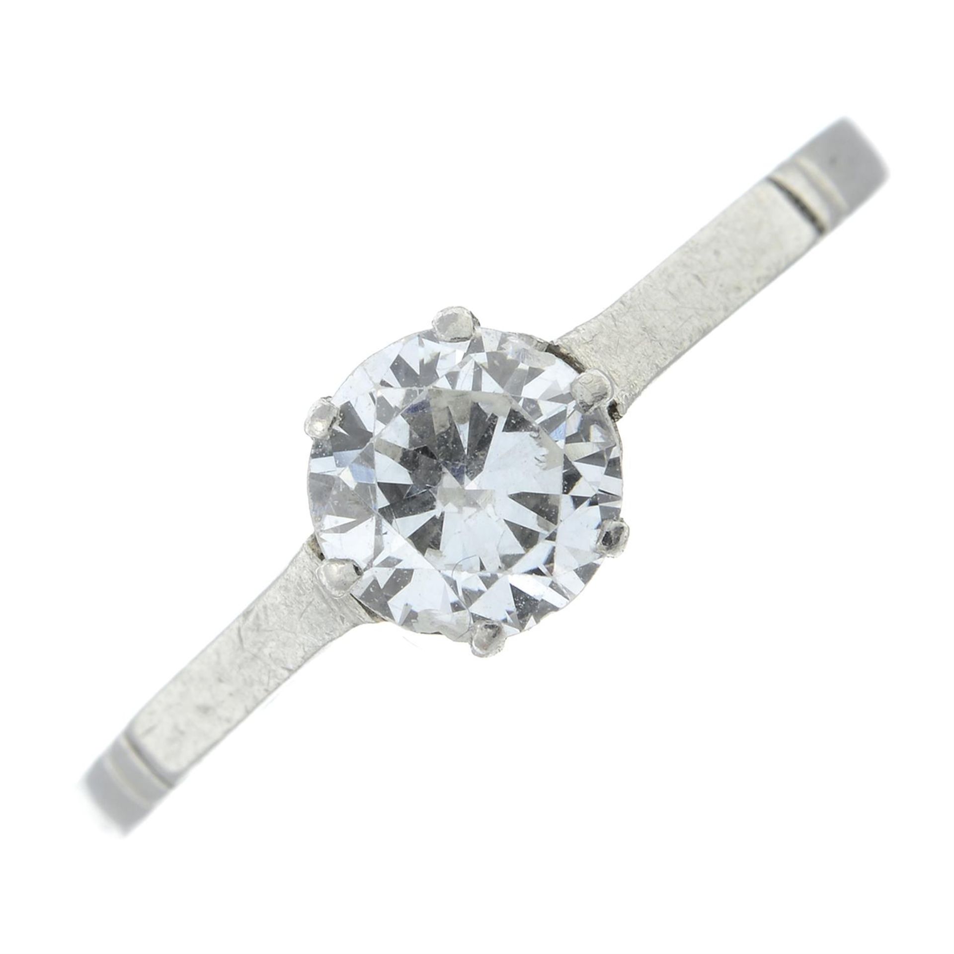 A brilliant-cut diamond single-stone ring.