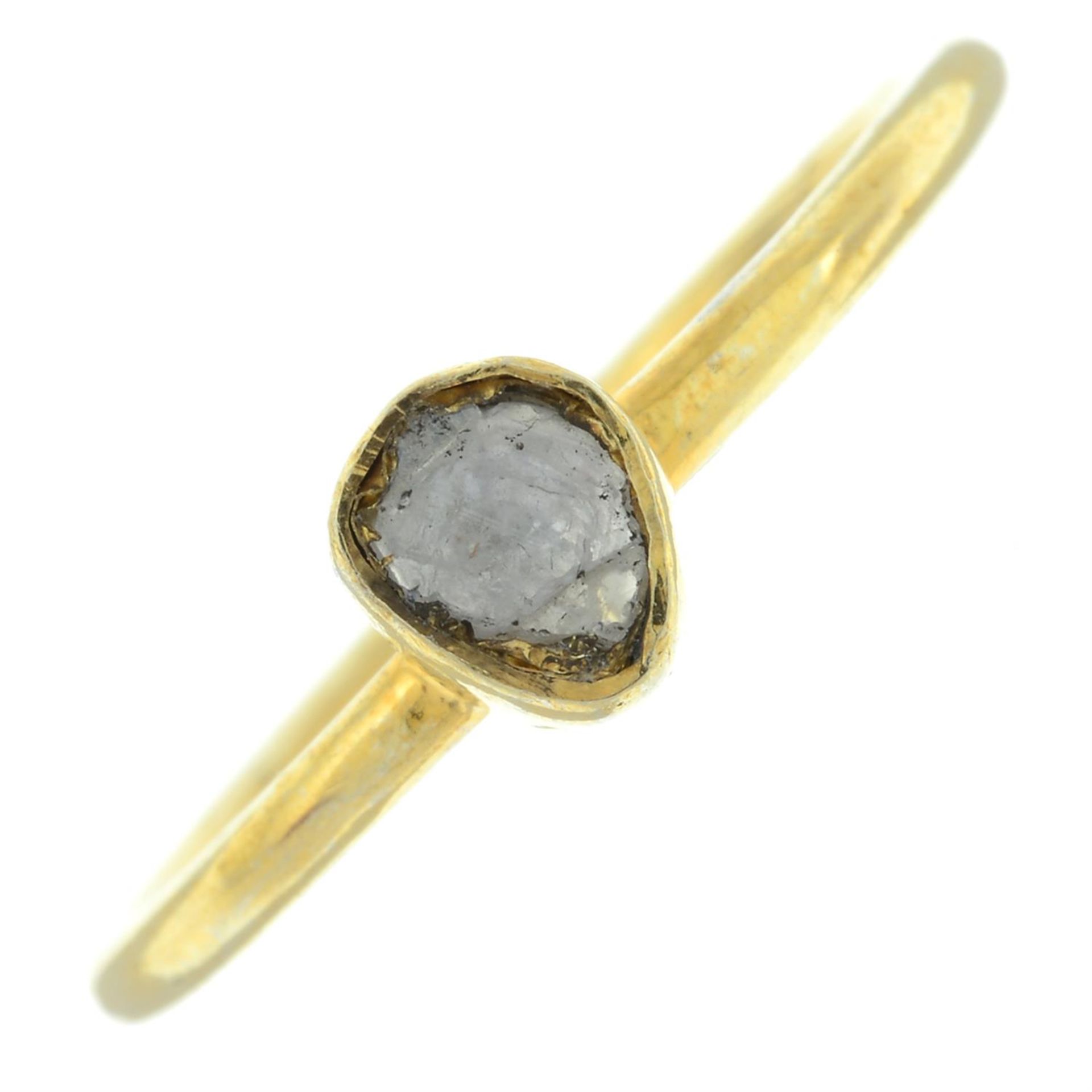 A polki diamond single-stone ring.