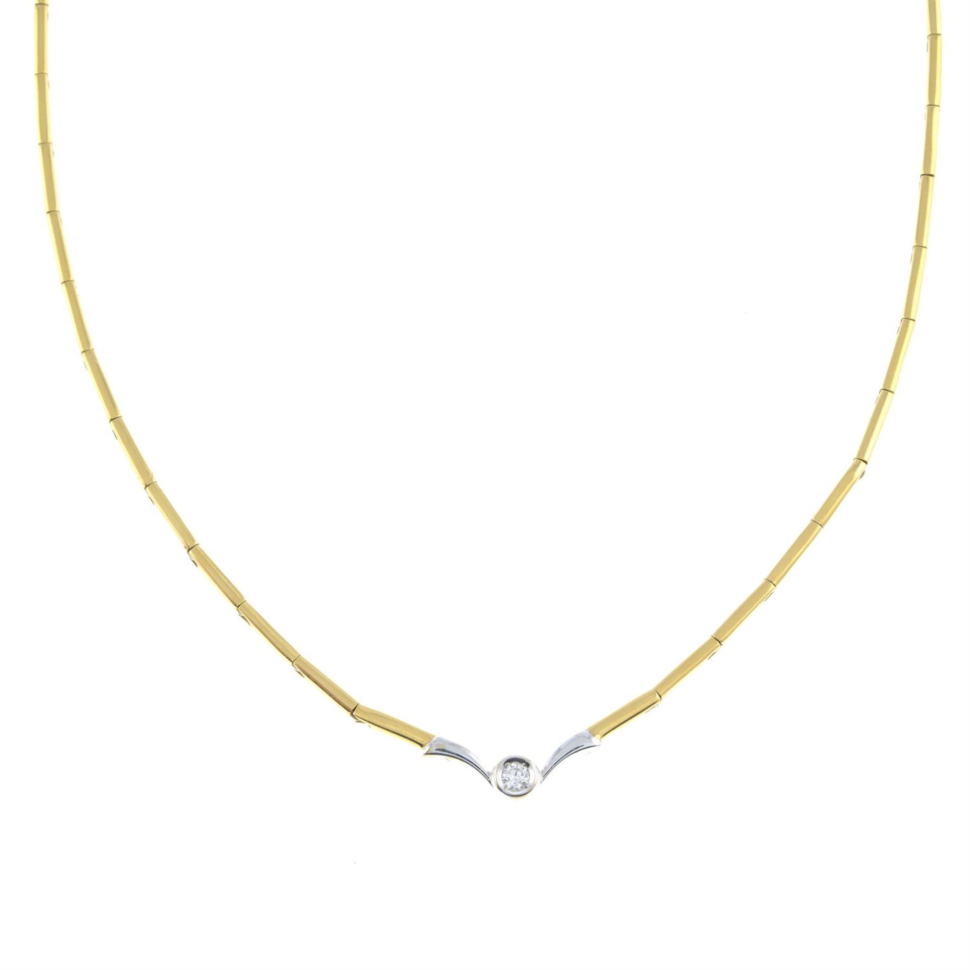 A diamond single-stone necklace, by Damiani.