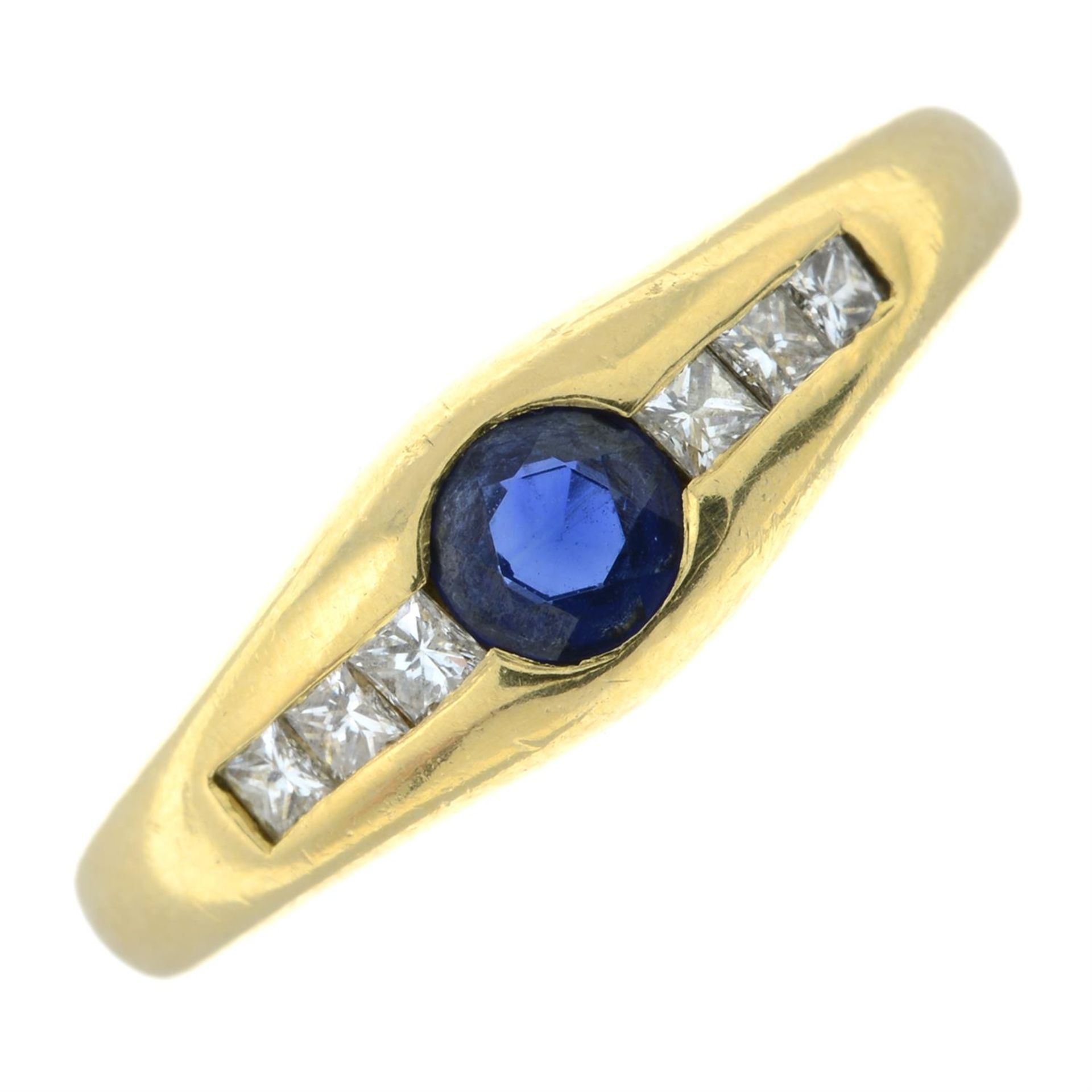 An 18ct gold square-cut diamond and sapphire ring.