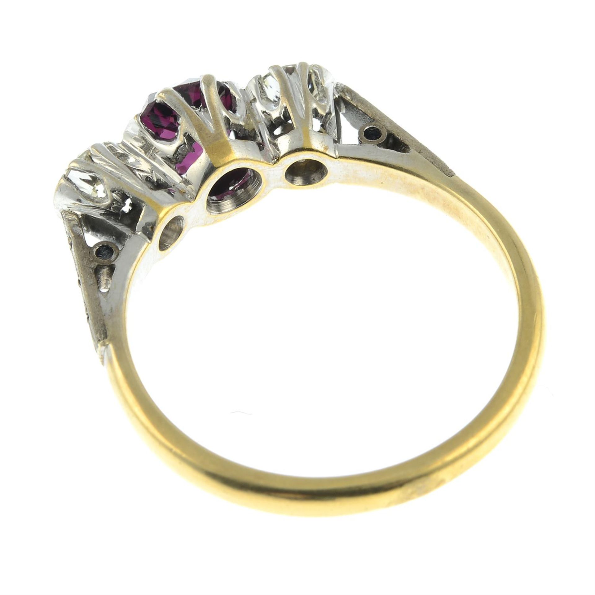 A garnet and brilliant-cut diamond three-stone ring. - Image 2 of 2