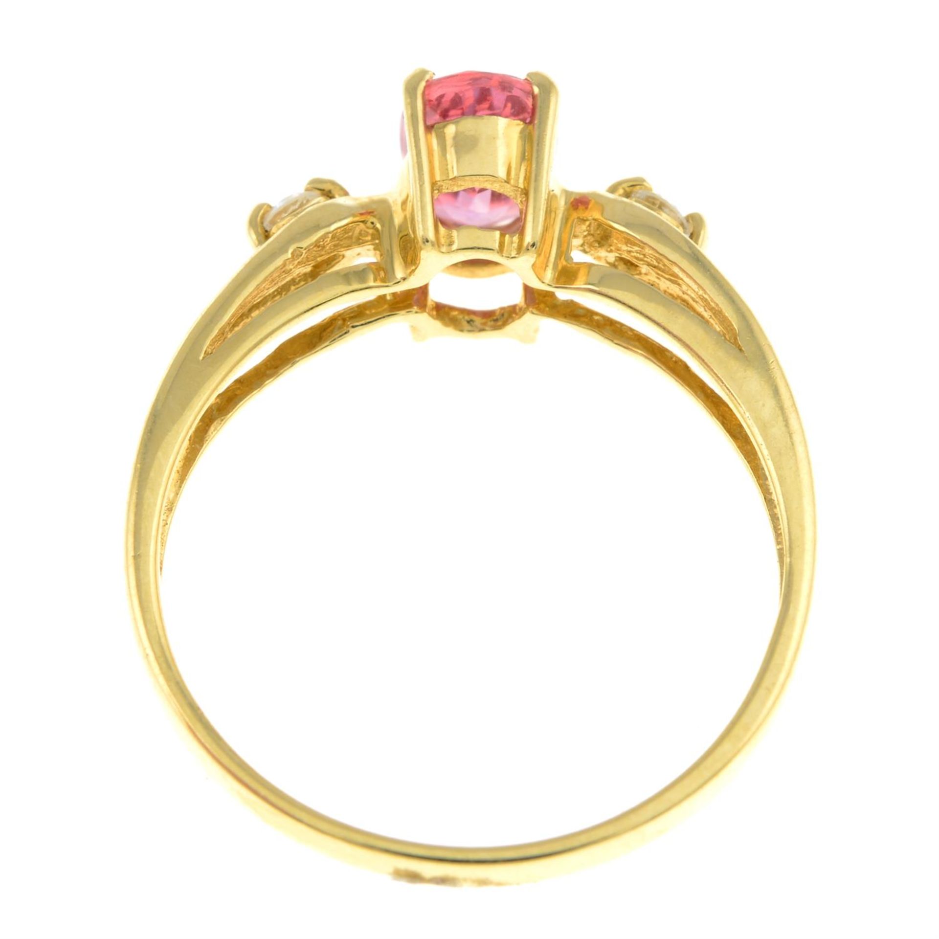 A 9ct gold orange sapphire and diamond three-stone ring. - Image 2 of 2