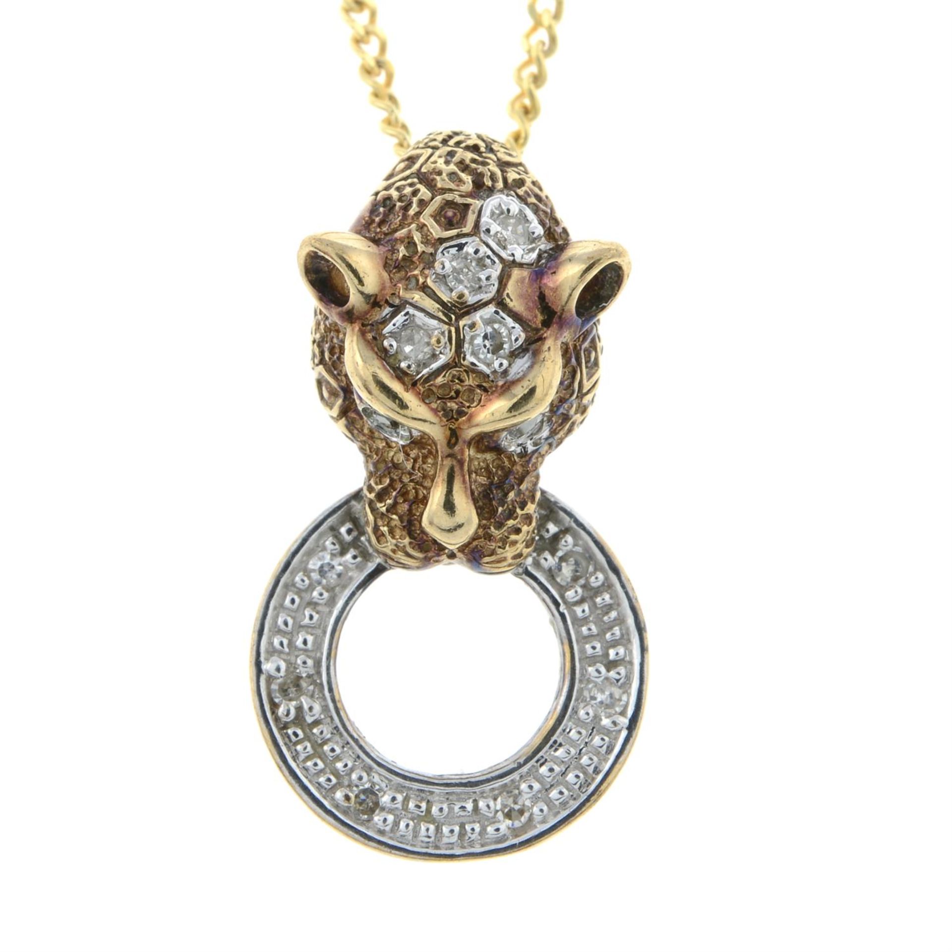 A diamond panther head pendant, with 9ct gold chain.