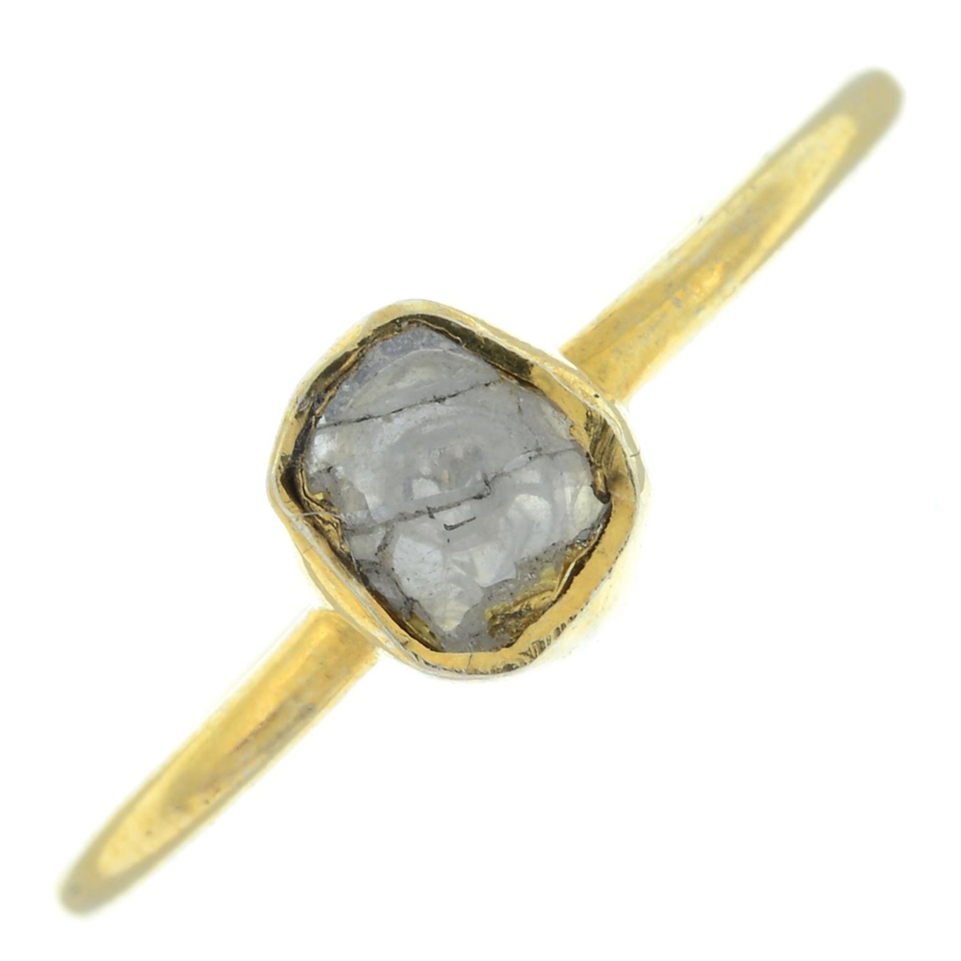 A polki diamond single-stone ring.