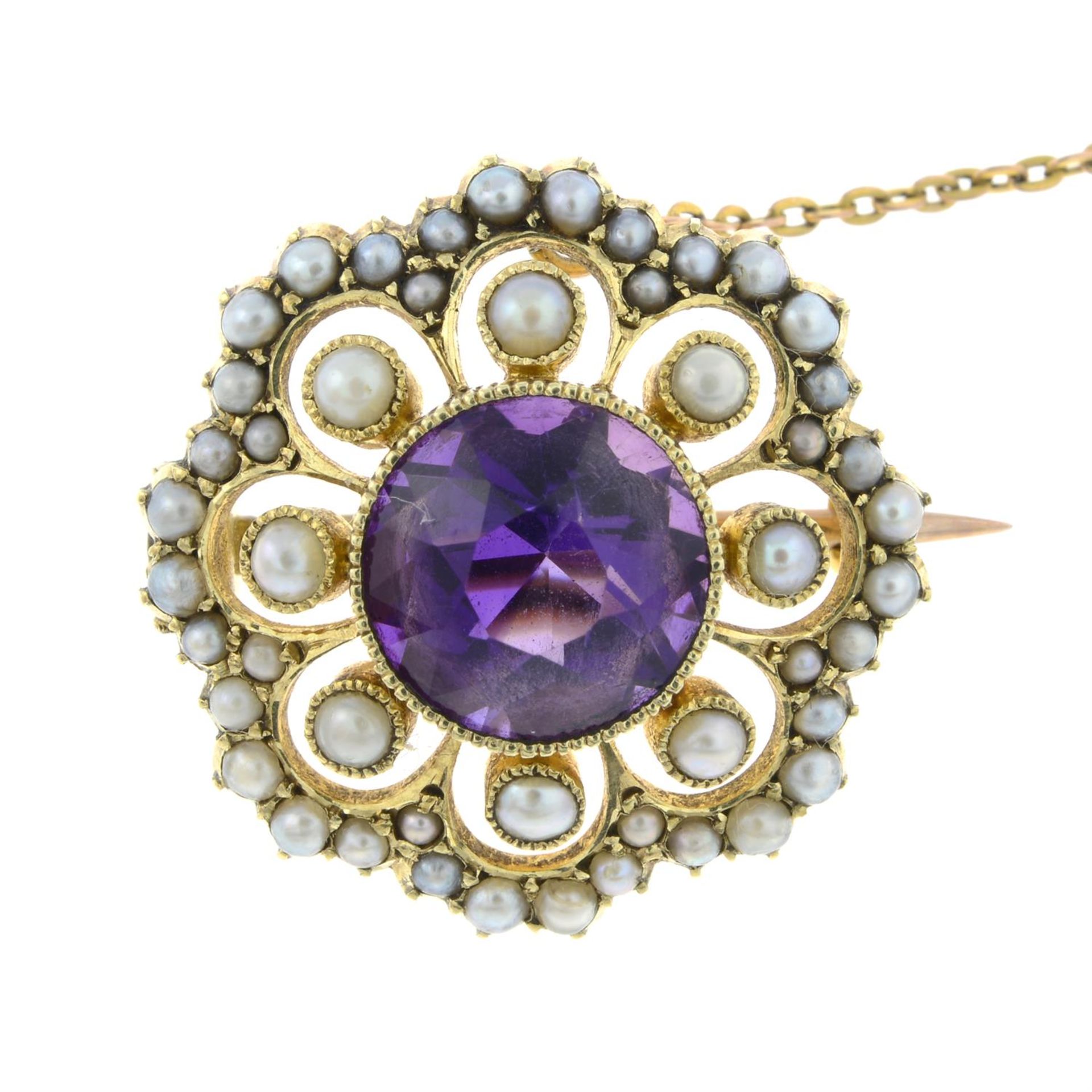 An early 20th century 15ct gold amethyst and split pearl brooch.