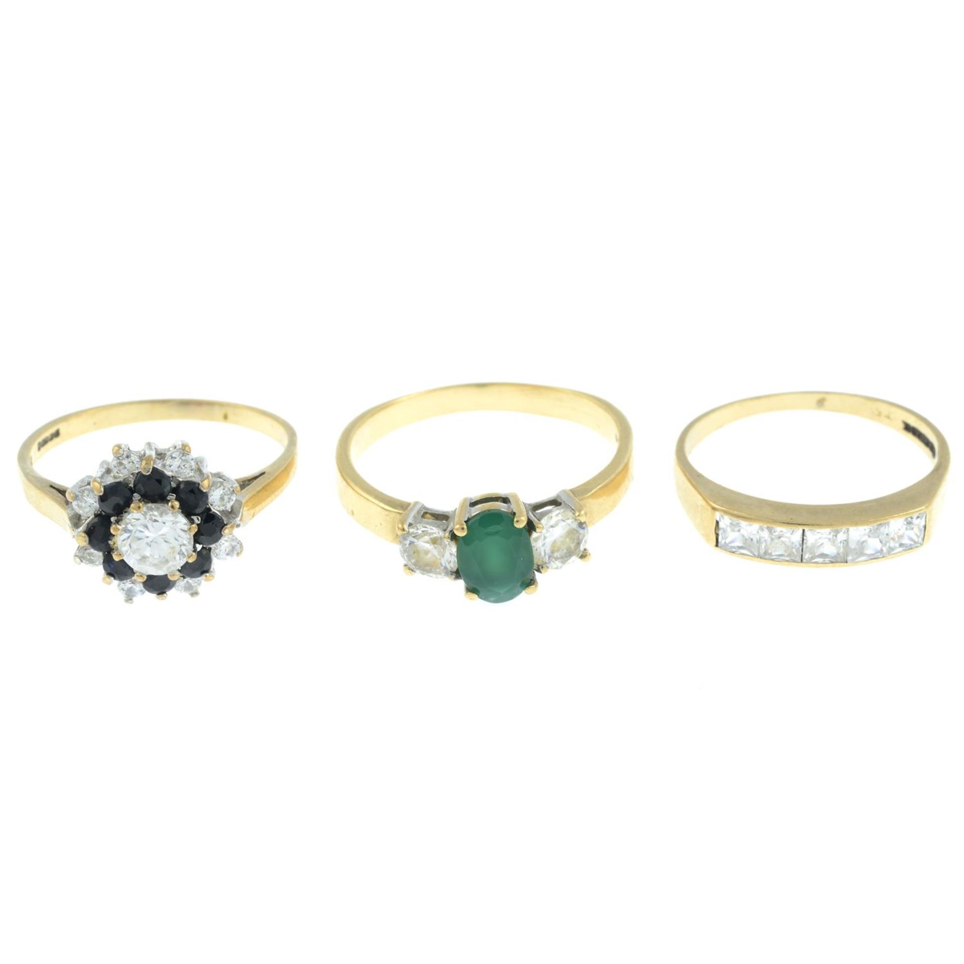 Three 9ct gold gem-set rings.