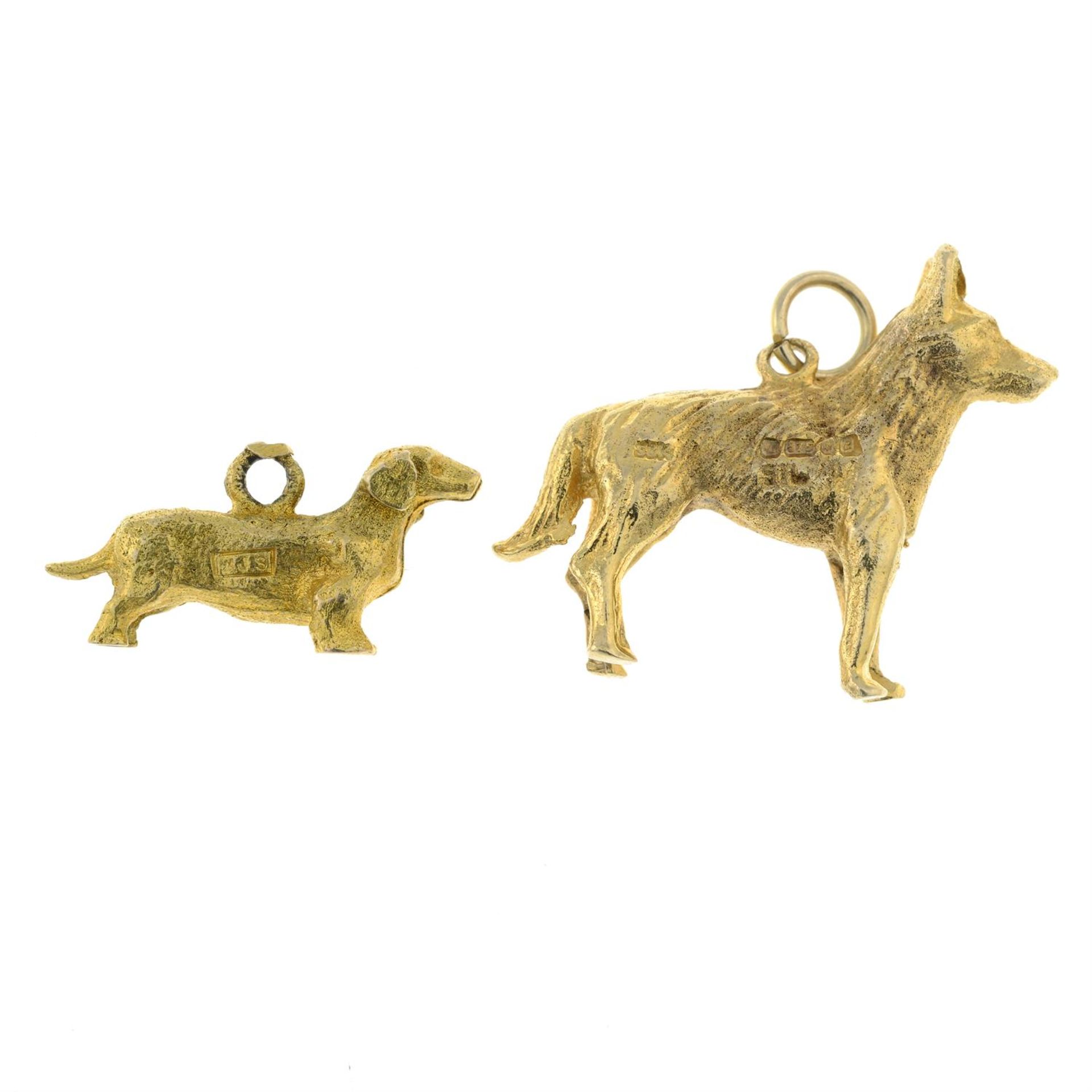 Two 9ct gold dog charms.