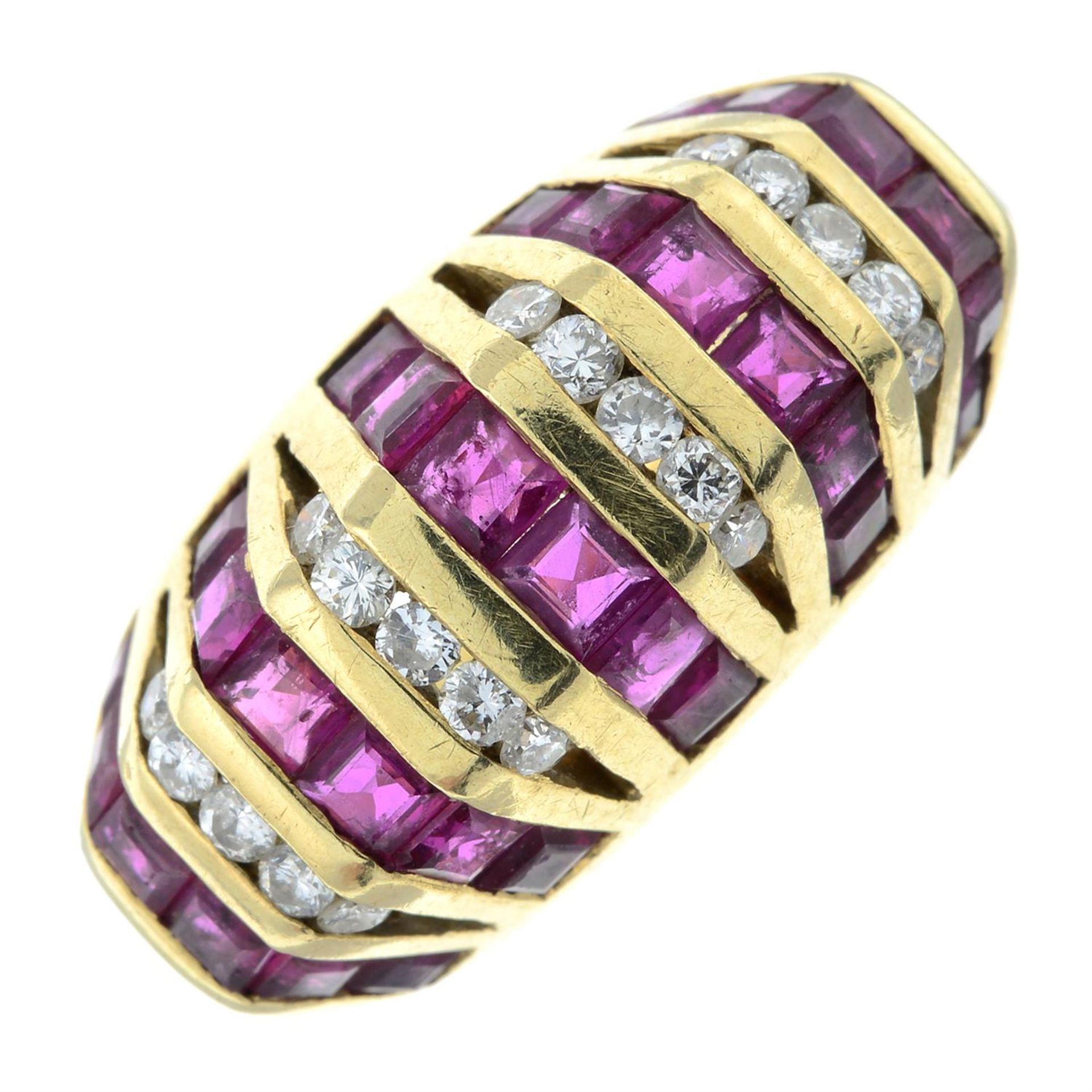 A calibre-cut ruby and brilliant-cut diamond banded dress ring.