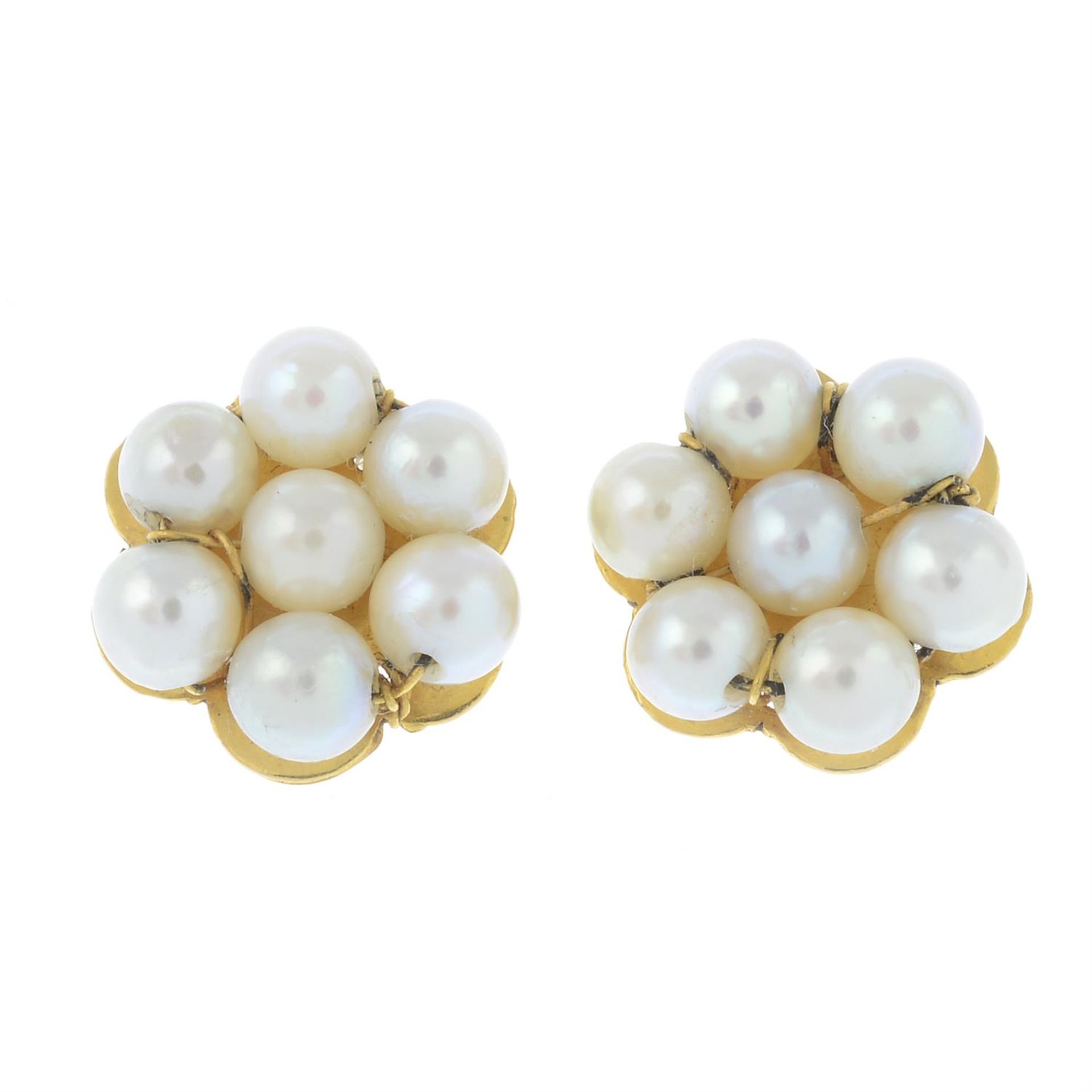 A pair of cultured pearl cluster earrings.