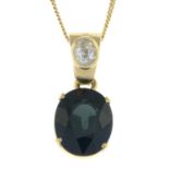 A green sapphire and diamond pendant, with 9ct gold trace-link chain.