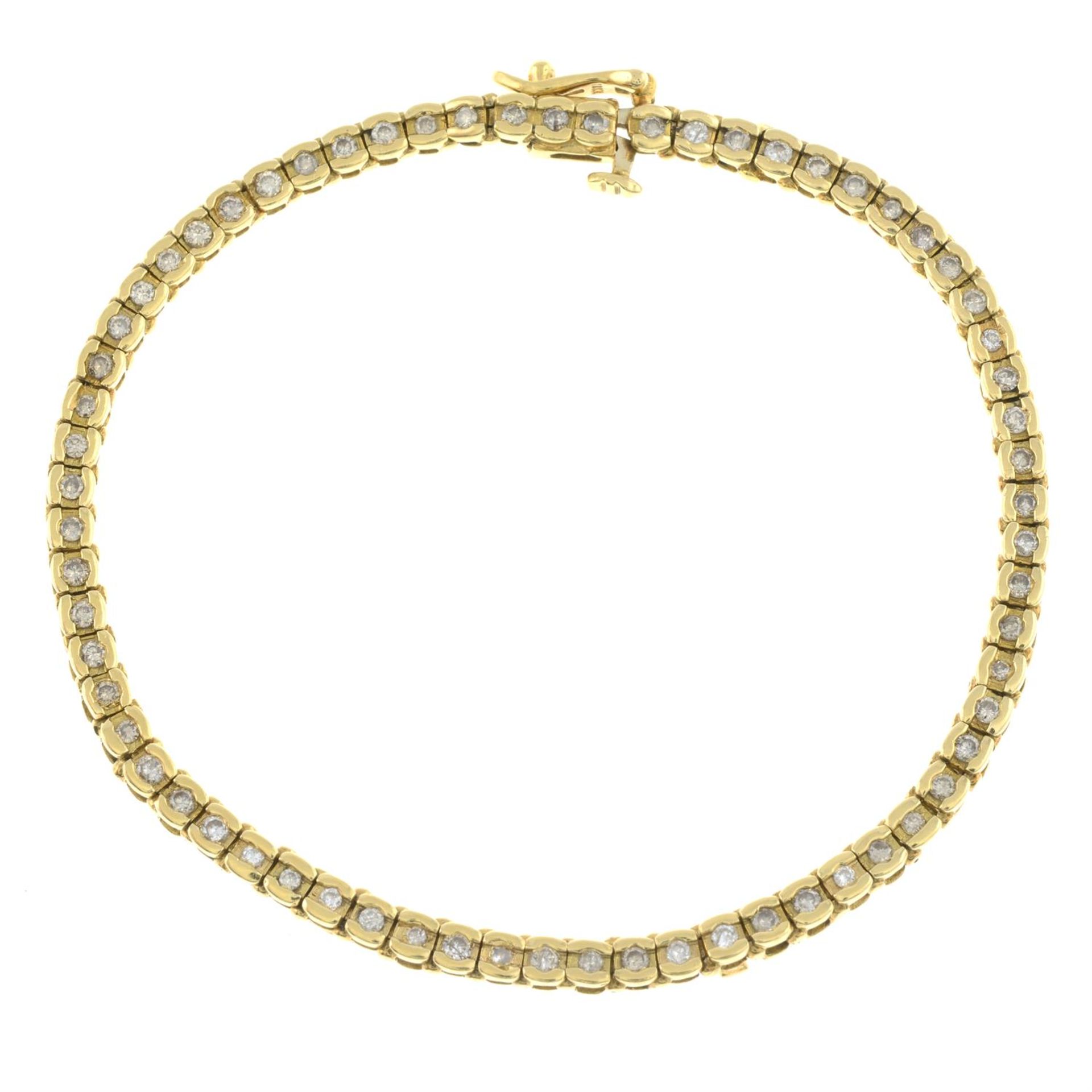 An 18ct gold diamond line bracelet.