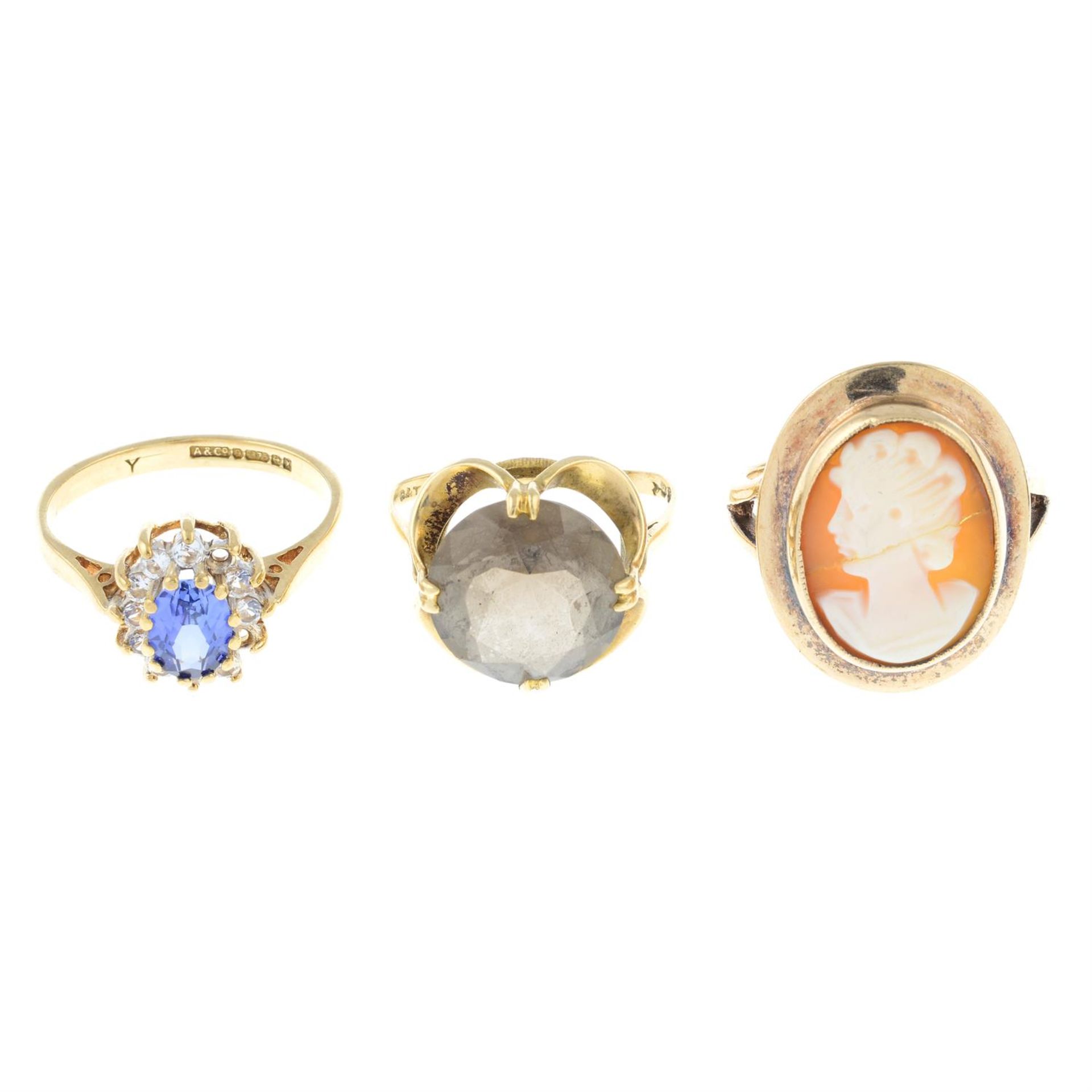 Three 9ct gold gem-set rings.