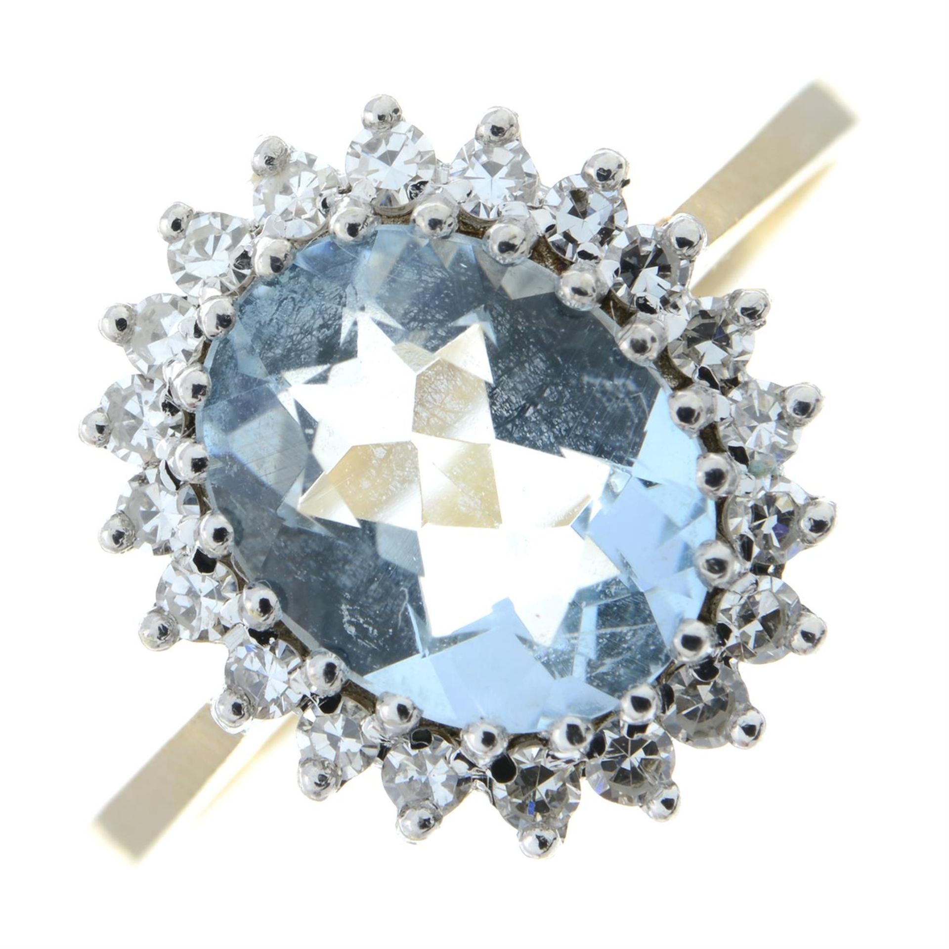 A 9ct gold aquamarine and diamond cluster ring.