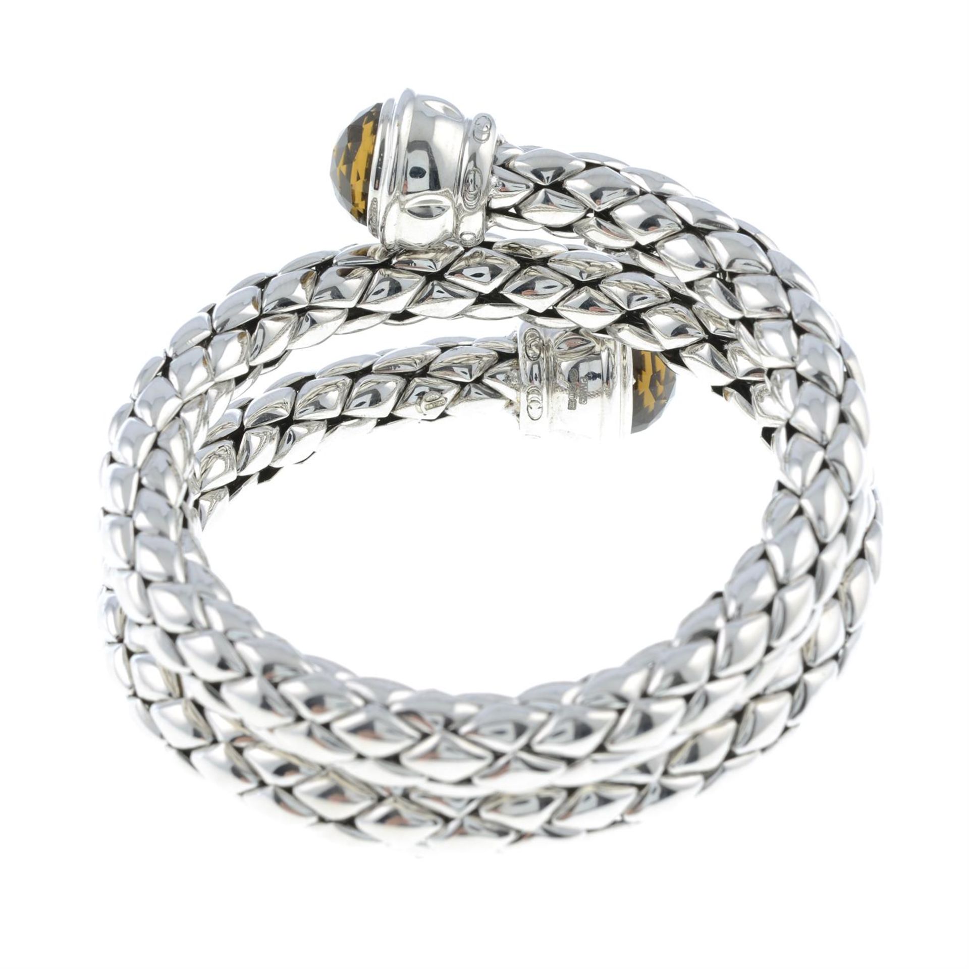 A silver bangle, with citrine terminals, by Chimento. - Image 2 of 2