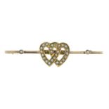 A late Victorian 14ct gold split pearl interlocking heart bar brooch.