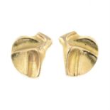 A pair of 14ct gold textured stud earrings.