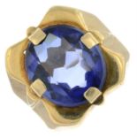 A synthetic sapphire signet ring.