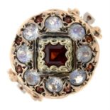 A garnet and moonstone cluster ring..