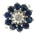 A 9ct gold sapphire and diamond cluster ring.