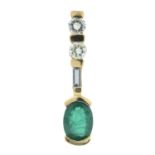 An emerald and diamond drop pendant.