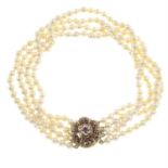 A cultured pearl four-strand necklace, with a detachable 9ct gold ruby and brilliant-cut diamond