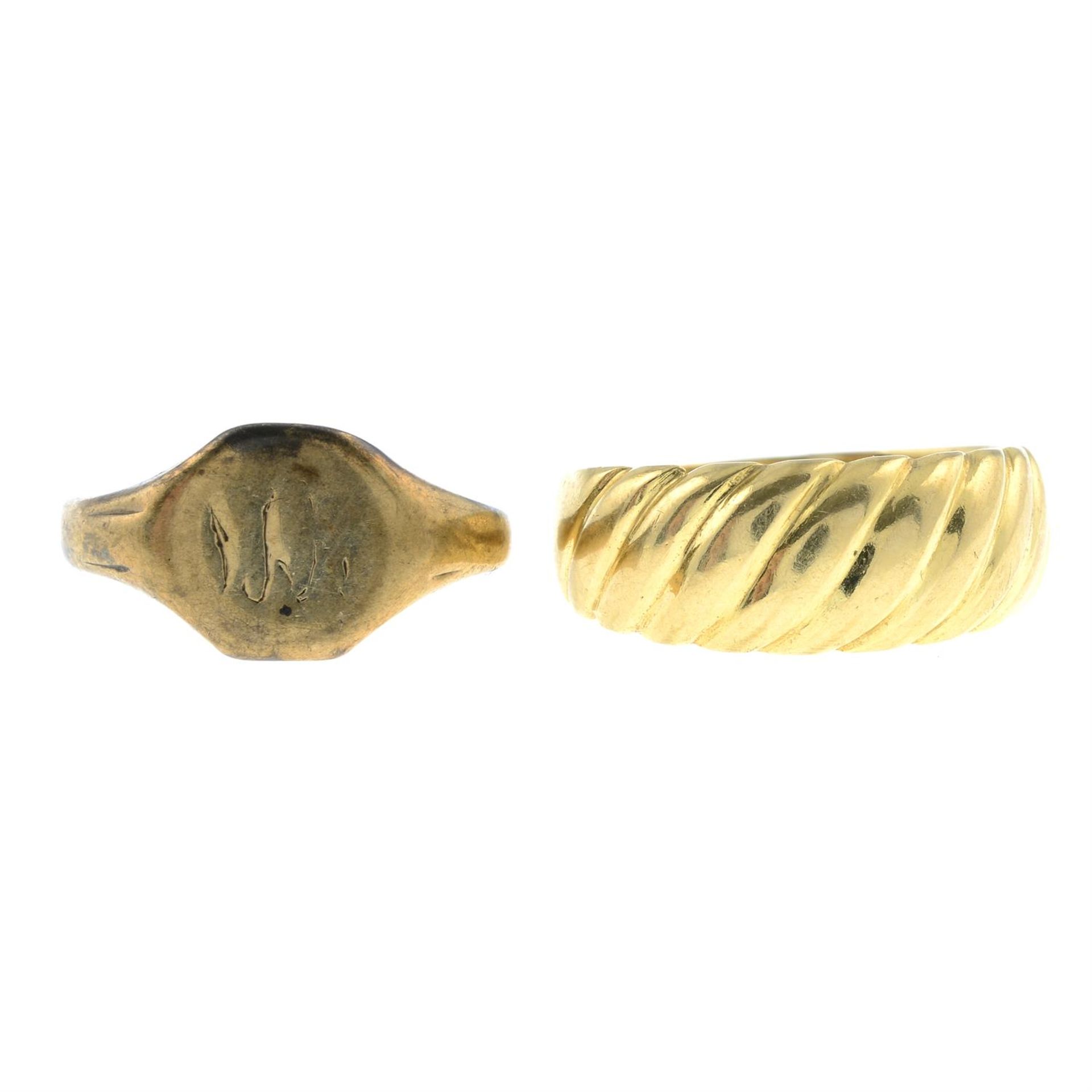 A 9ct gold signet ring and a dress ring.