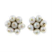 A pair of cultured pearl cluster earrings.