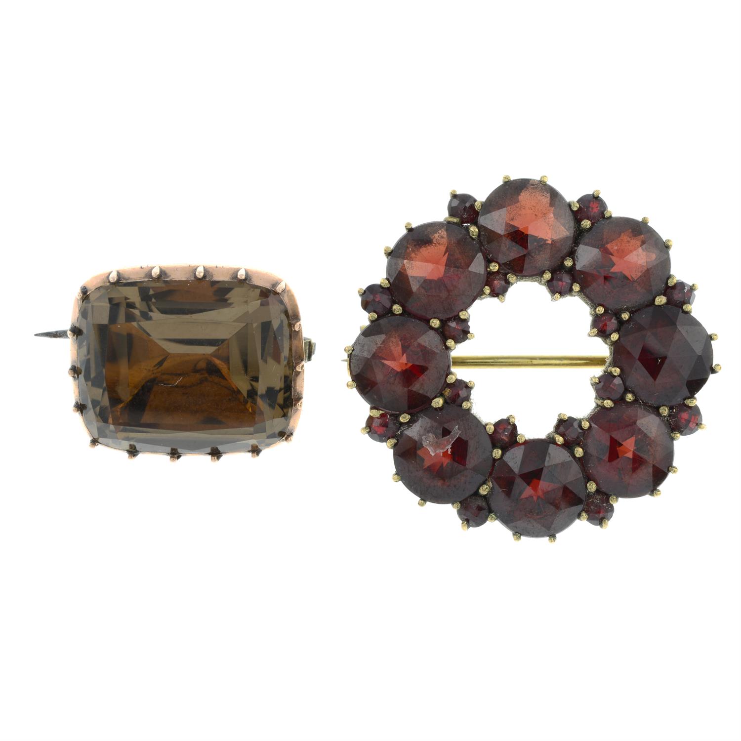 A 19th century foil-back quartz brooch and a 'Bohemian garnet' brooch.