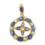 A sapphire and split pearl pendant.