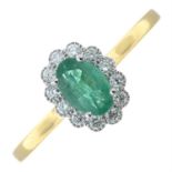 An 18ct gold emerald and brilliant-cut diamond cluster ring.