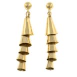 A pair of tiered bell drop earrings.