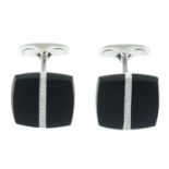 A pair of 18ct gold onyx and diamond cufflinks, by Emil Kraus.