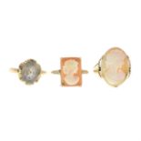 Three gem-set rings, comprising two shell cameo rings and one smoky quartz ring.