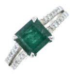 An emerald and brilliant-cut diamond dress ring.