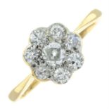 A diamond floral cluster ring.