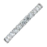 A brilliant-cut diamond half-eternity ring.