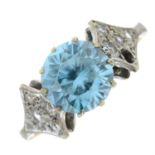 A 9ct gold blue zircon and colourless gem dress ring.
