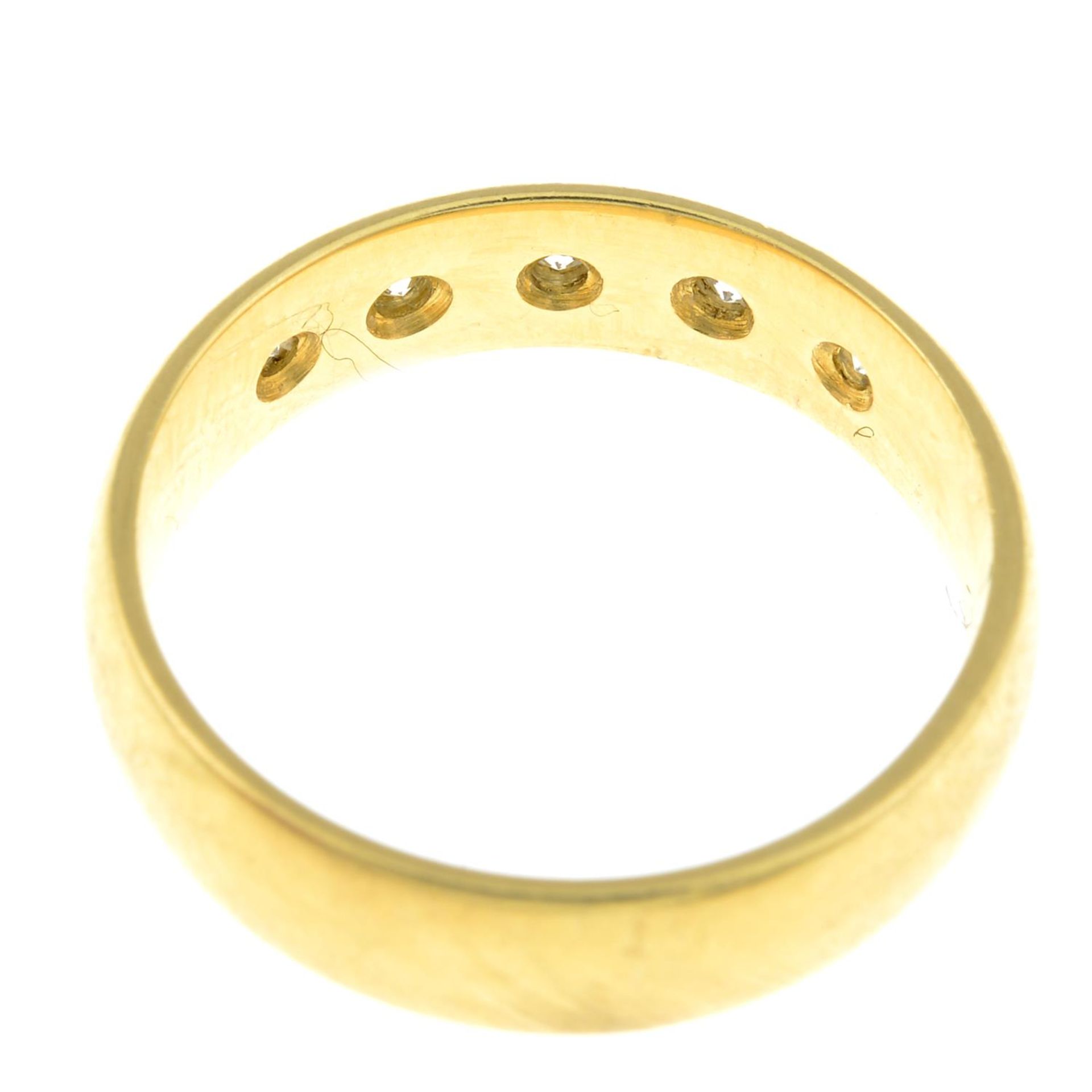 An 18ct gold band ring, with diamond highlights. - Image 2 of 2