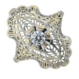 A brilliant-cut diamond openwork ring.