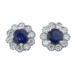 A pair of 18ct gold sapphire and diamond cluster earrings.