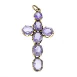 An amethyst cross pendant.