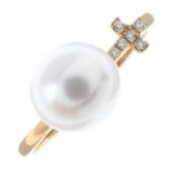 A cultured pearl ring, with pavé-set diamond cross detail.