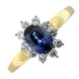 An 18ct gold sapphire and diamond cluster ring.